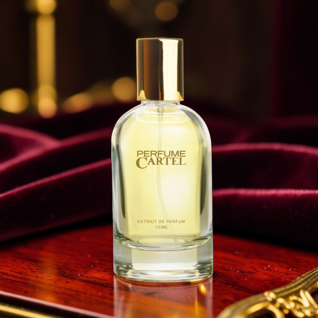 Perfume Cartel bottle on a wooden surface with a blurred background