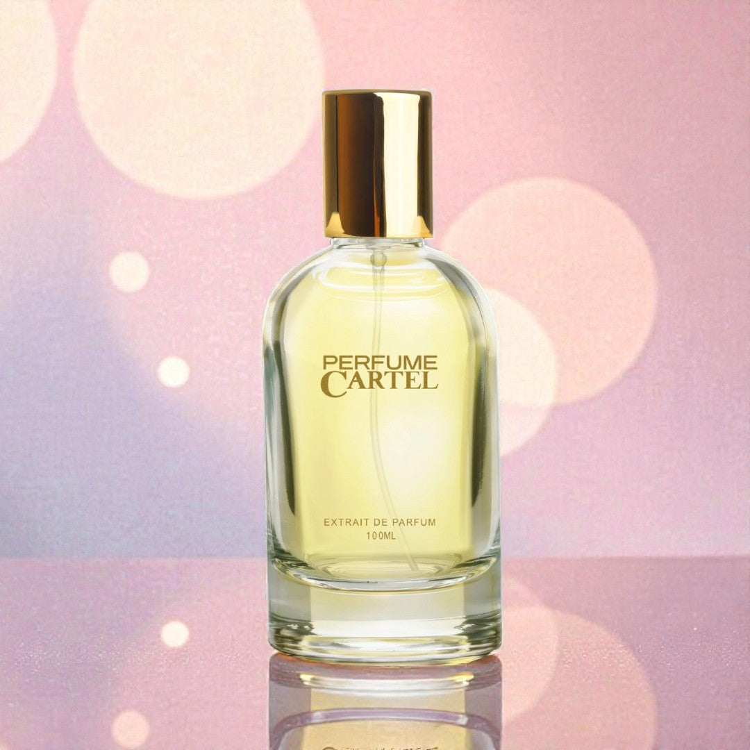 Perfume Cartel bottle on a pink background with bokeh effect