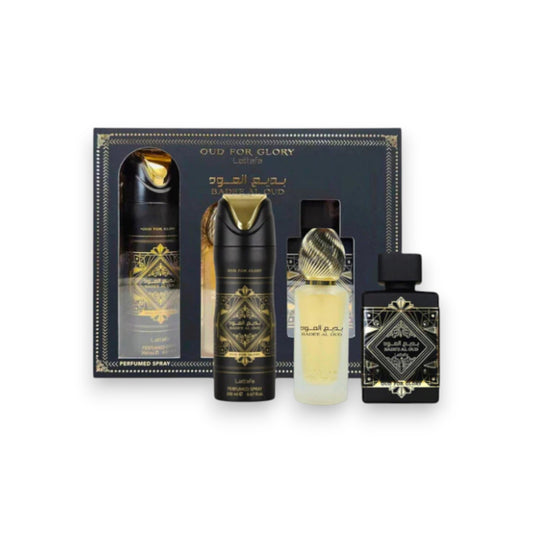 Set of perfume bottles with decorative packaging on a white background