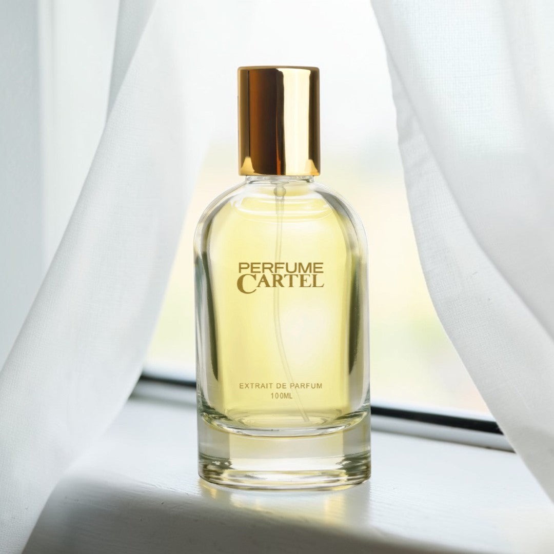 Perfume Cartel extract de parfum bottle with gold cap on a white background