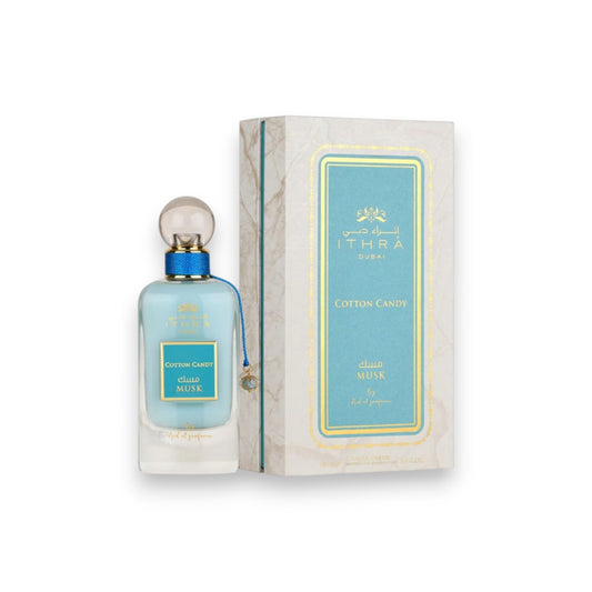 cotton candy Ithra musk perfume bottle and box on a white background