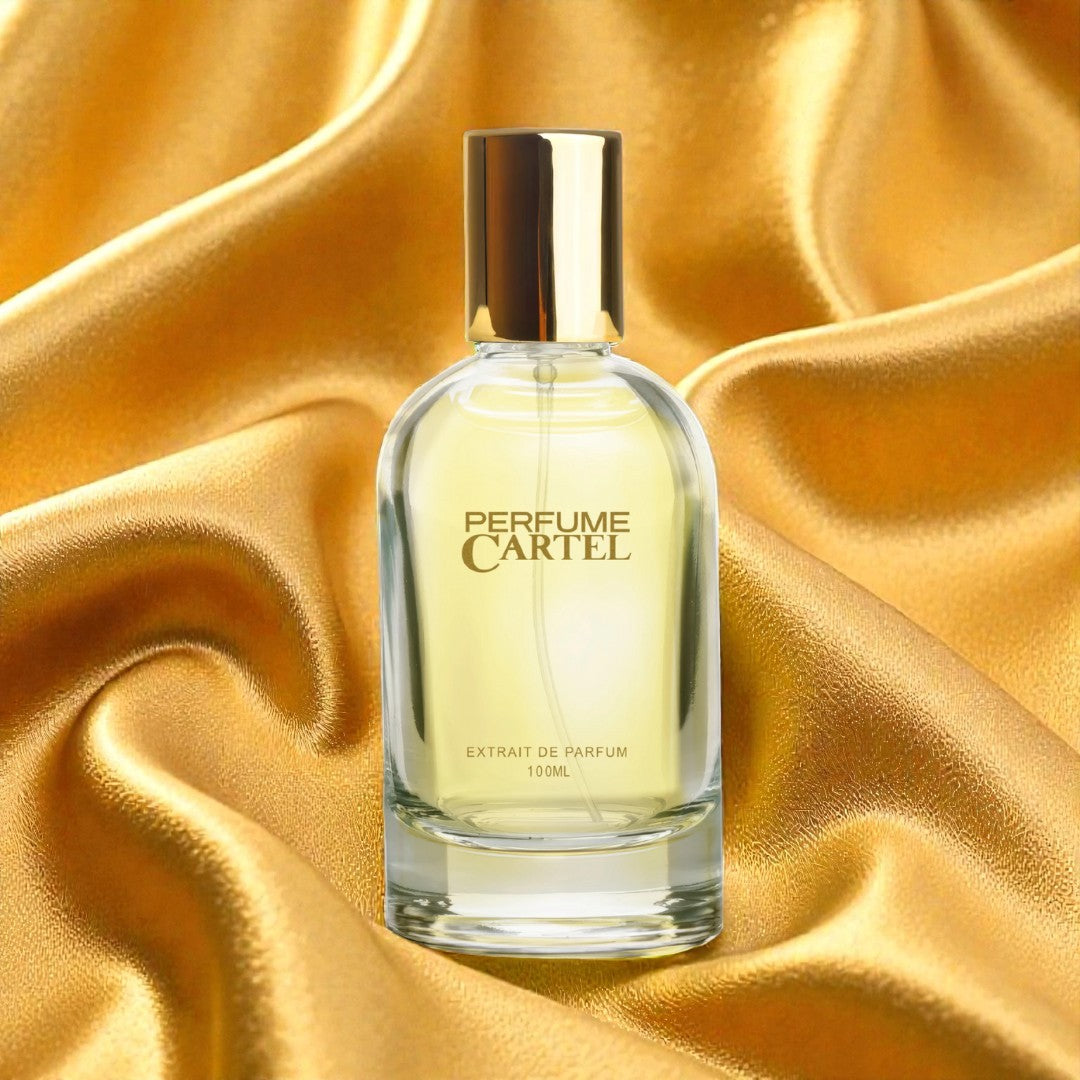 Perfume Cartel bottle on a gold fabric background