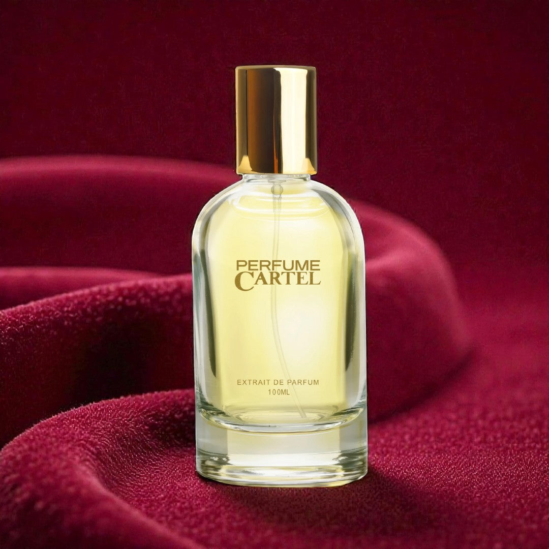 Perfume Cartel bottle on a red fabric background
