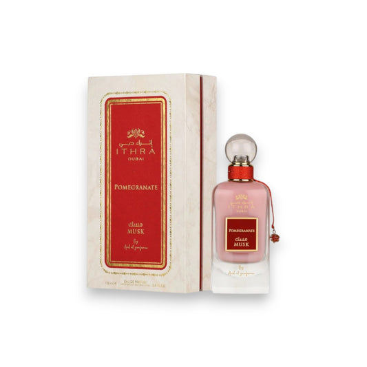 pomegranate Ithra musk perfume bottle and box on a white background