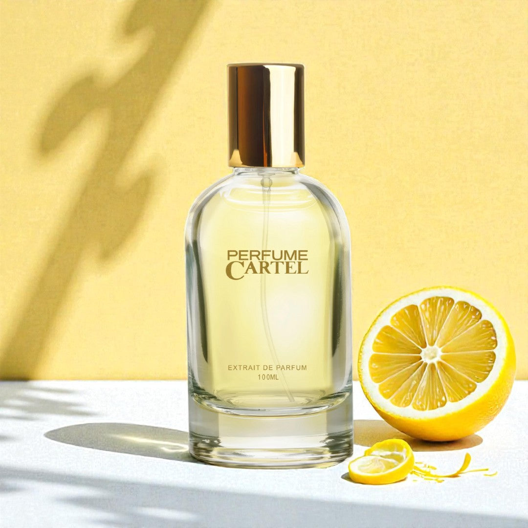 Perfume Cartel bottle with a lemon on a yellow background